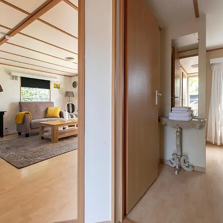 47, Betoverend Oisterwijkse Bosverblijf ~ Uitzicht Chalet